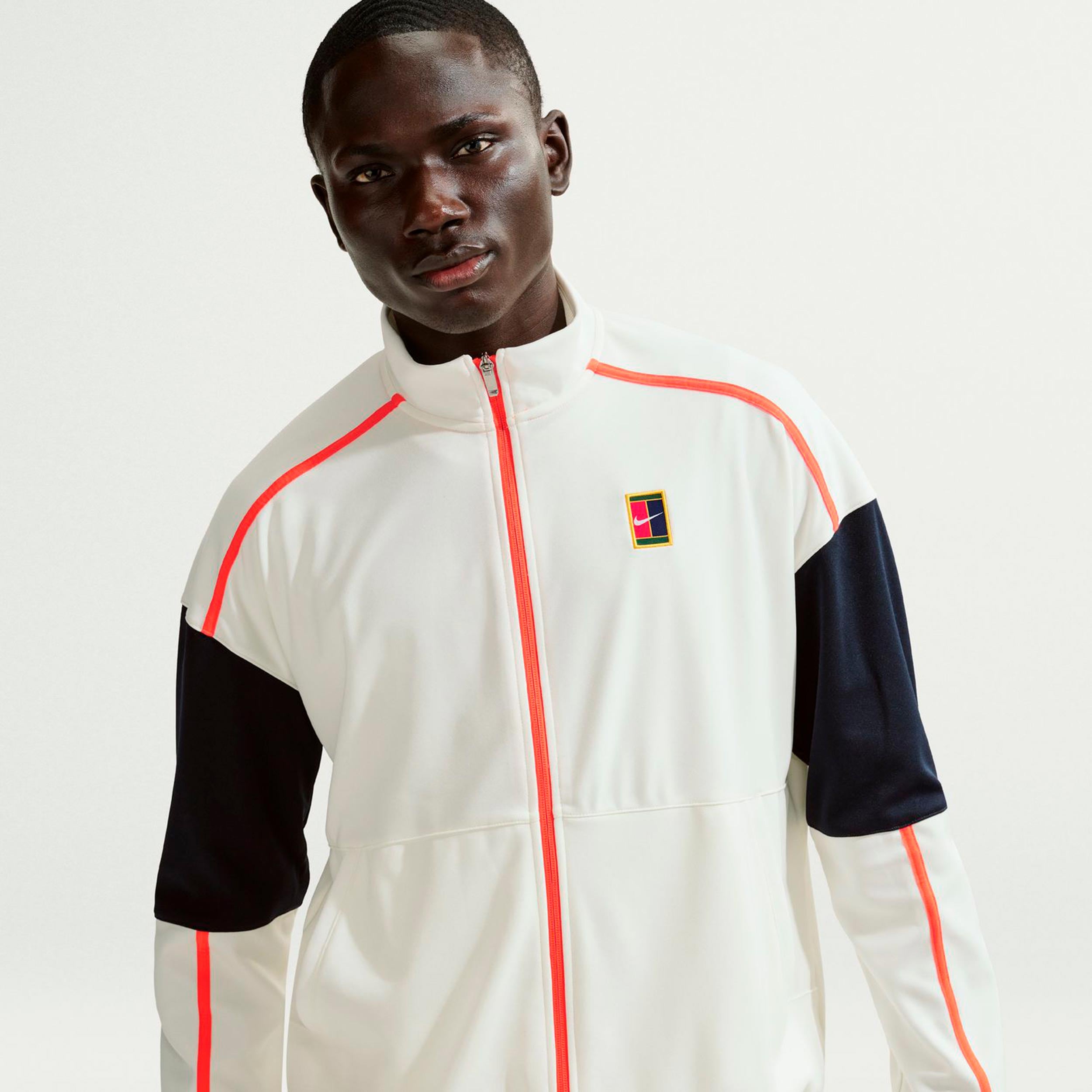 Nike Court Heritage Chaqueta de entrenamiento Hombres-crema, naranja