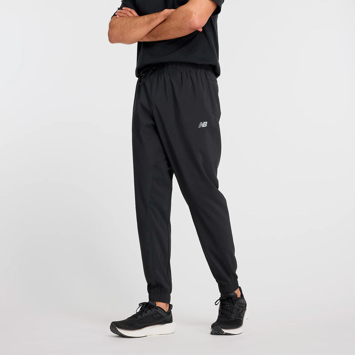 New Balance Essentials Woven Pantalón de entrenamiento Hombres - negro